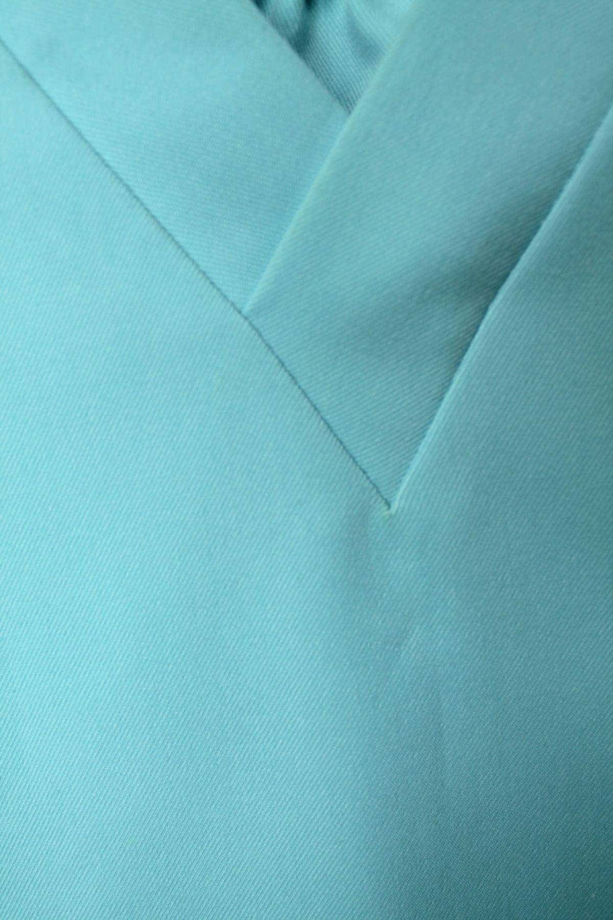 bo-scrubs-xanh-mint-nu-navi Bộ scrubs xanh mint cổ tim NAVI